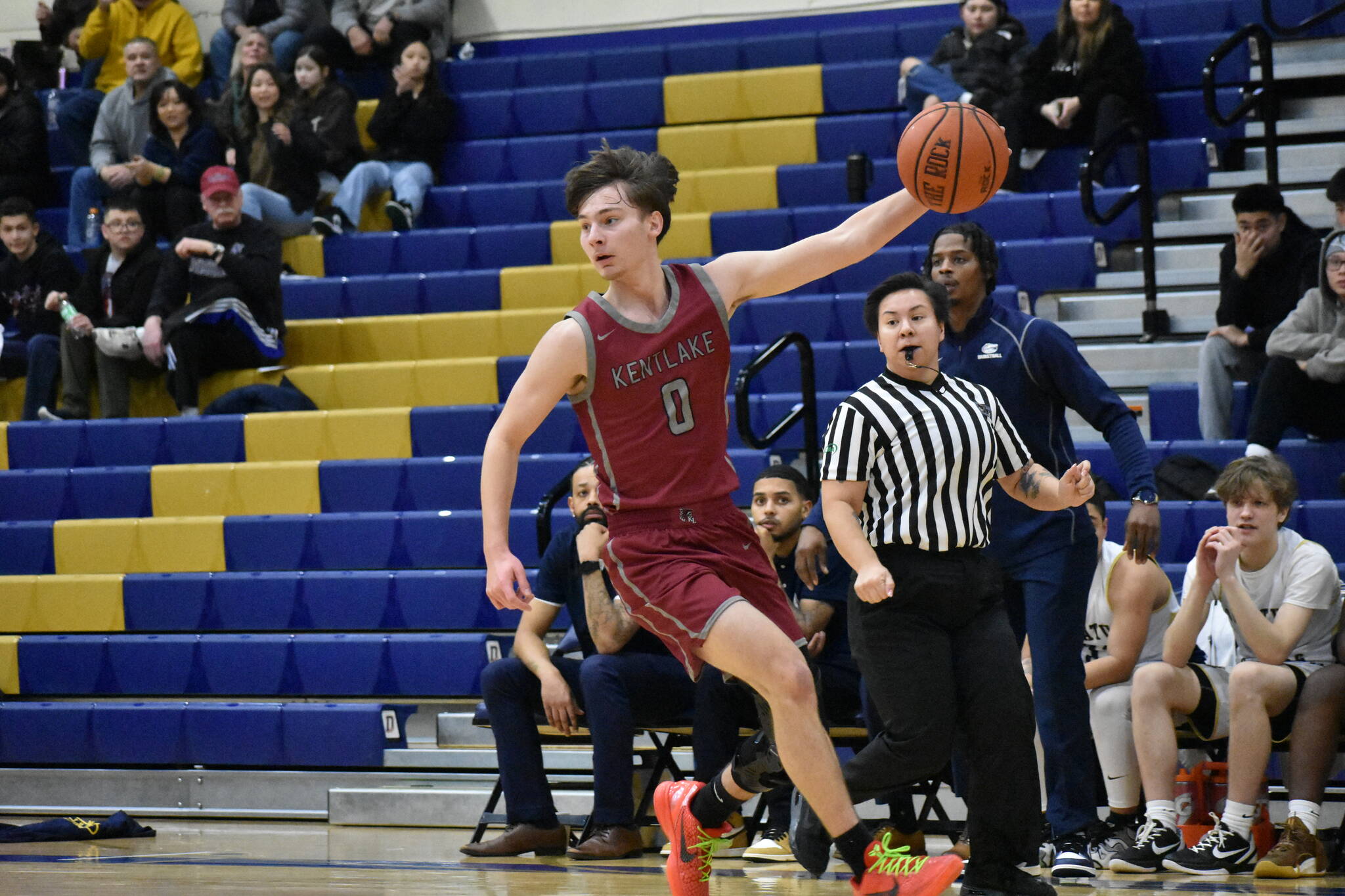 Kentlake’s Matthew Lawrence reels the ball in against Decatur. Ben Ray / The Reporter