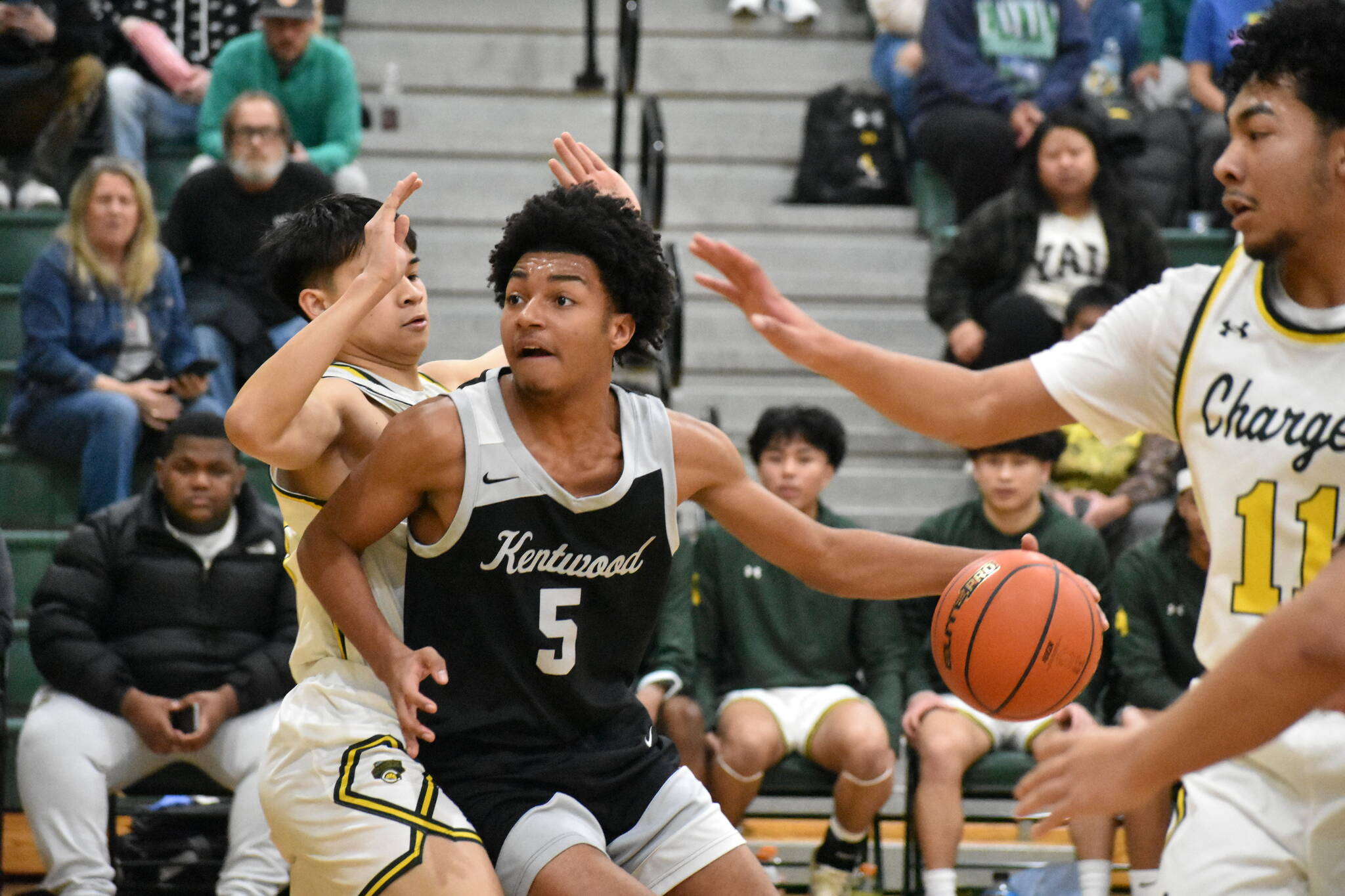 Kentwood’s Mason St. Louis drives to the basket. Ben Ray / The Reporter