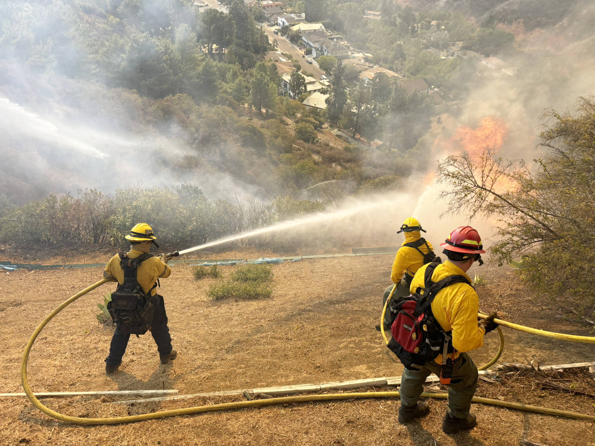 Kent-based Puget Sound Fire firefighters battle the Palisades fire near Los Angeles. COURTESY PHOTO, Puget Sound Fire