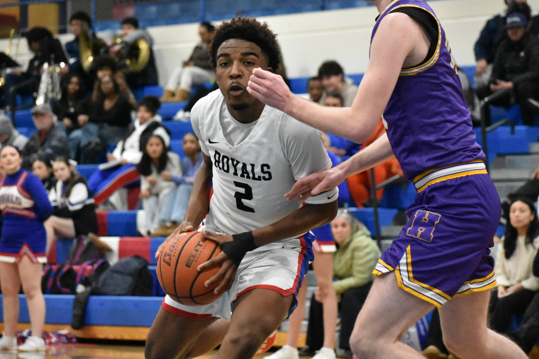 Kent-Meridian senior Christian Mortimer drives to the basket. Ben Ray / The Reporter