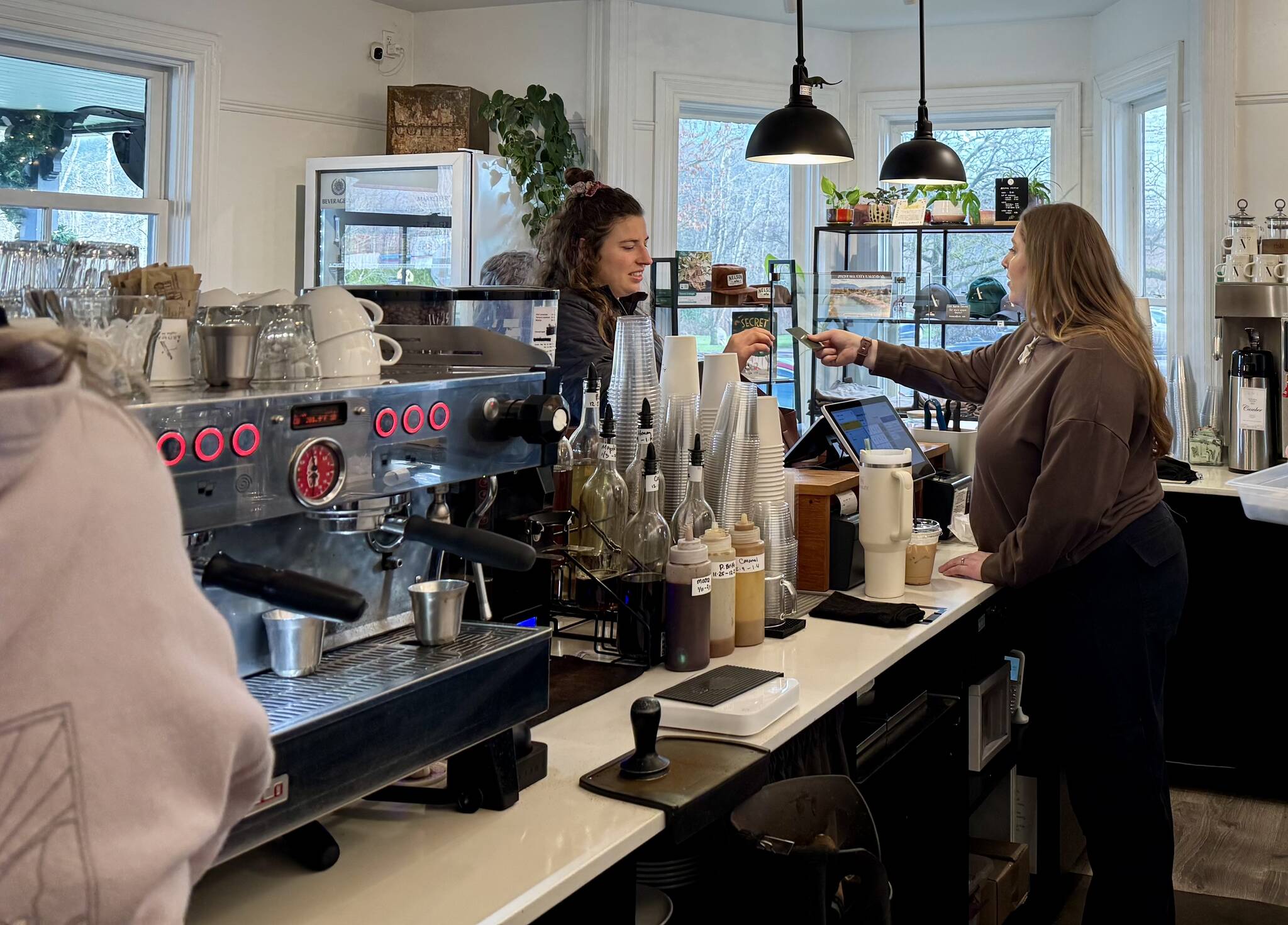 Employees work at Fall City’s Aroma Coffee Co. on Jan. 14, 2025. (Grace Gorenflo/Valley Record)